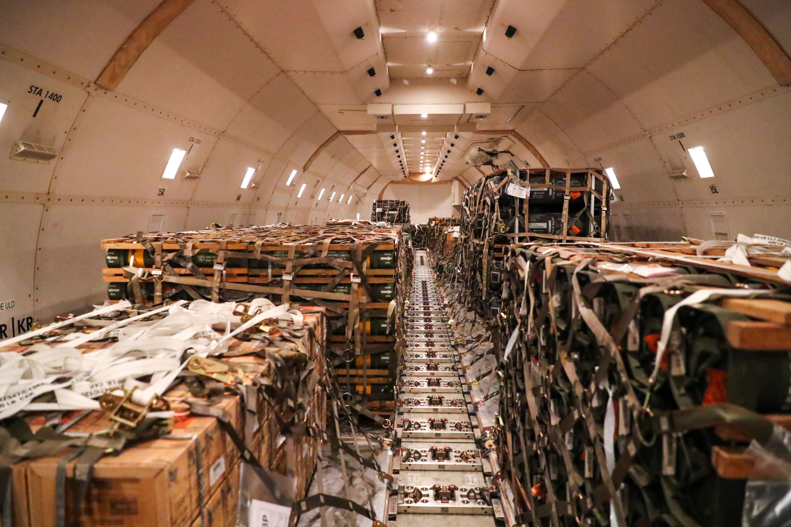 a large group of boxes in a cargo plane